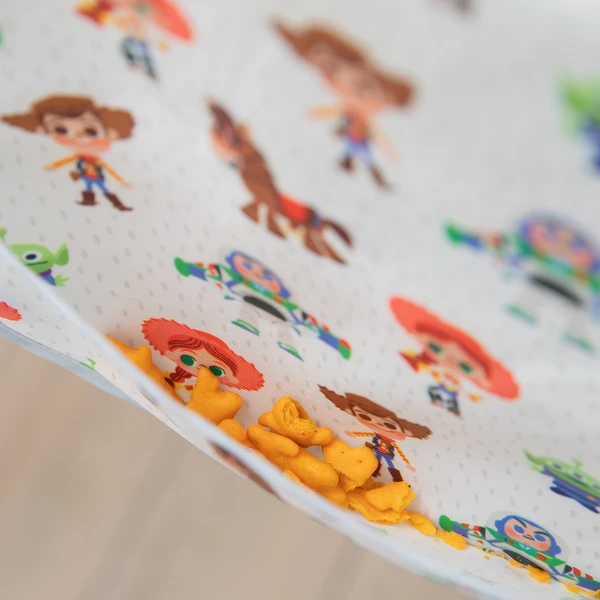 Bumkins Sleeved Bib – Toy Story (6-24 Months)